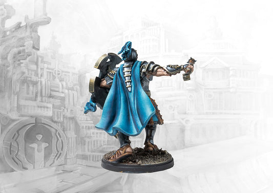 A rear view of the painted City States Dorilates miniature, showcasing the back of the armor and the detail of the flowing blue cape.