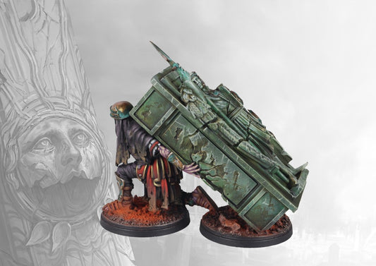 A fully painted Old Dominion Dark Cenotaph miniature for Conquest, featuring a hunched figure in dark robes carrying a heavy, weathered stone cenotaph.