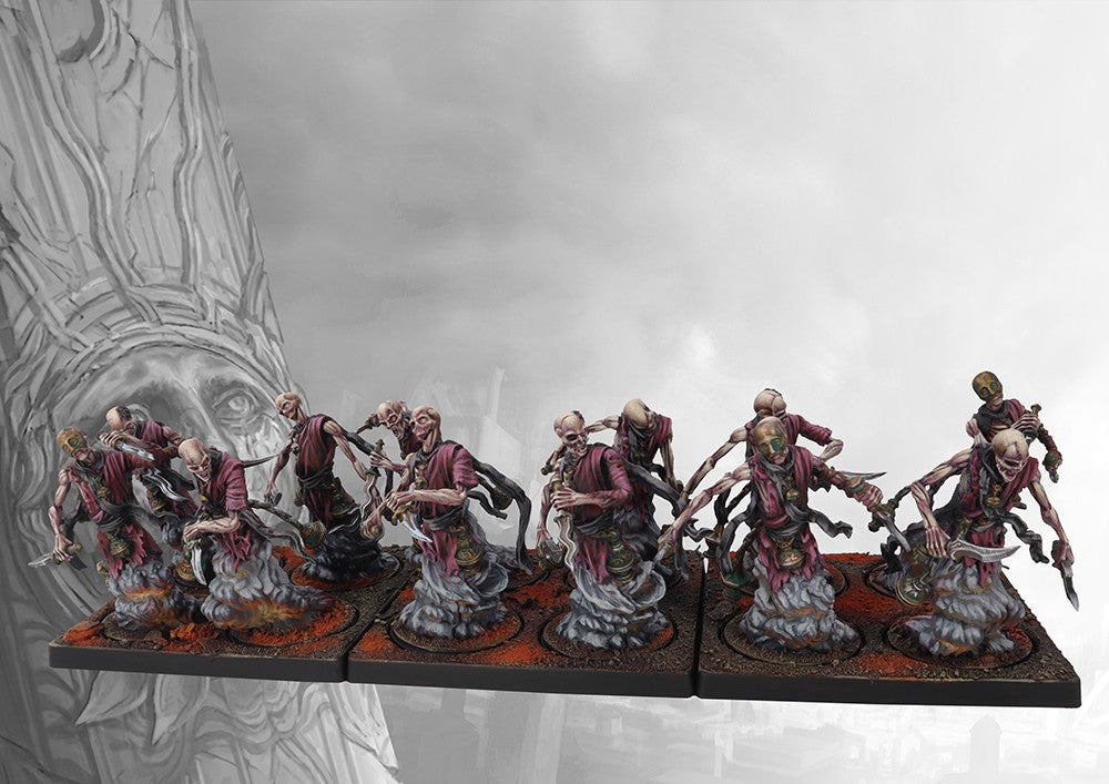 A fully painted unit of twelve Old Dominion Moroi miniatures on square bases, depicted as masked spectral figures armed with daggers and emerging from smoke.