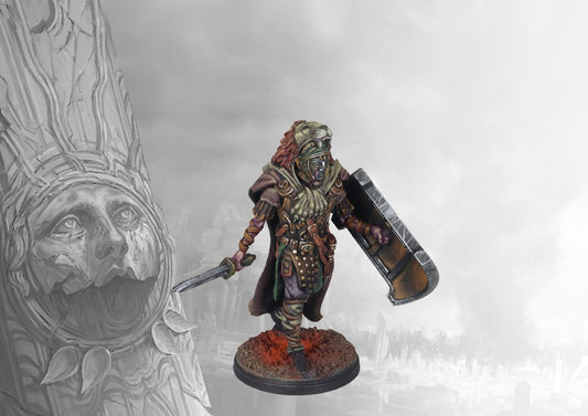 A fully painted Old Dominion Strategos miniature for Conquest, wearing a lion pelt and masked helmet, and carrying a large shield and sword.