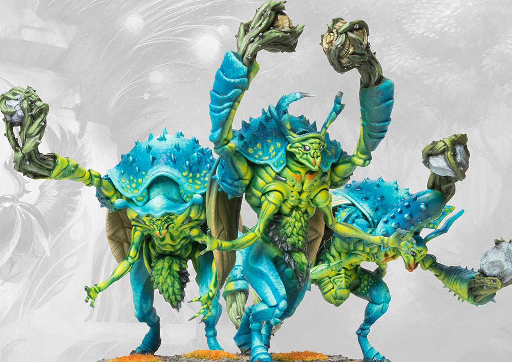 A dynamic trio of Gallowglass Wardens for the Spires, showcasing the teal and yellow iridescent organic armor plates of these Weaver Courts biological creations.