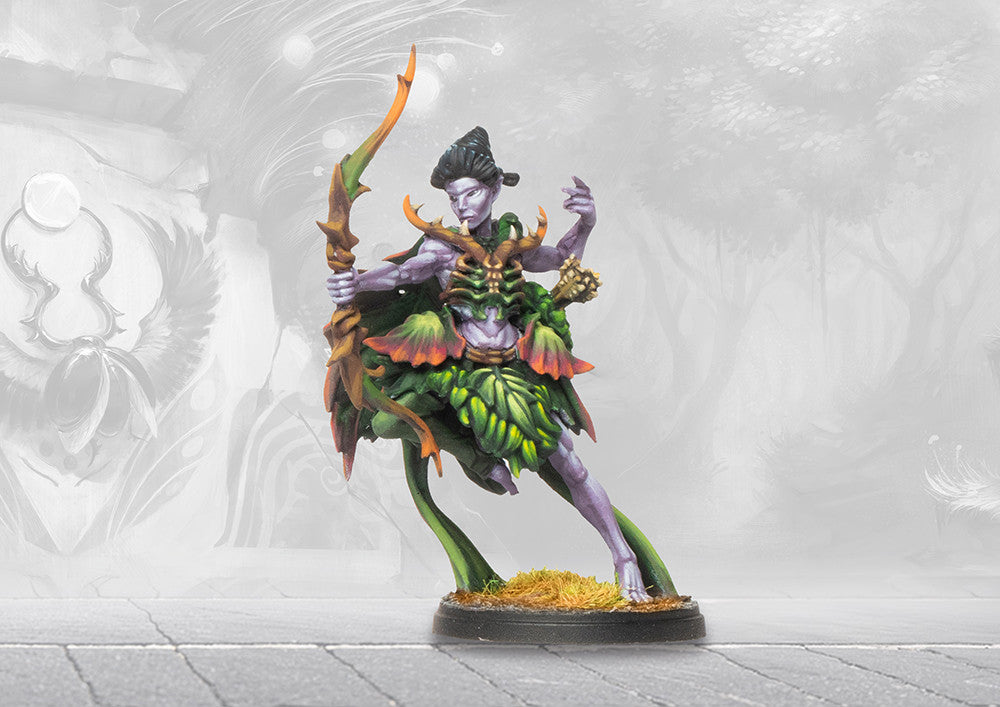 A studio-painted miniature of the Rhun Sidhe from Conquest, a purple-skinned fey archer in leafy green armor drawing a large bow.