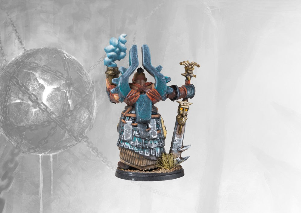 Rear view of the painted Dweghom Ardent Kerawegh miniature, emphasizing his large horns, heavy ceremonial armor, and the sword sheathed on his back.