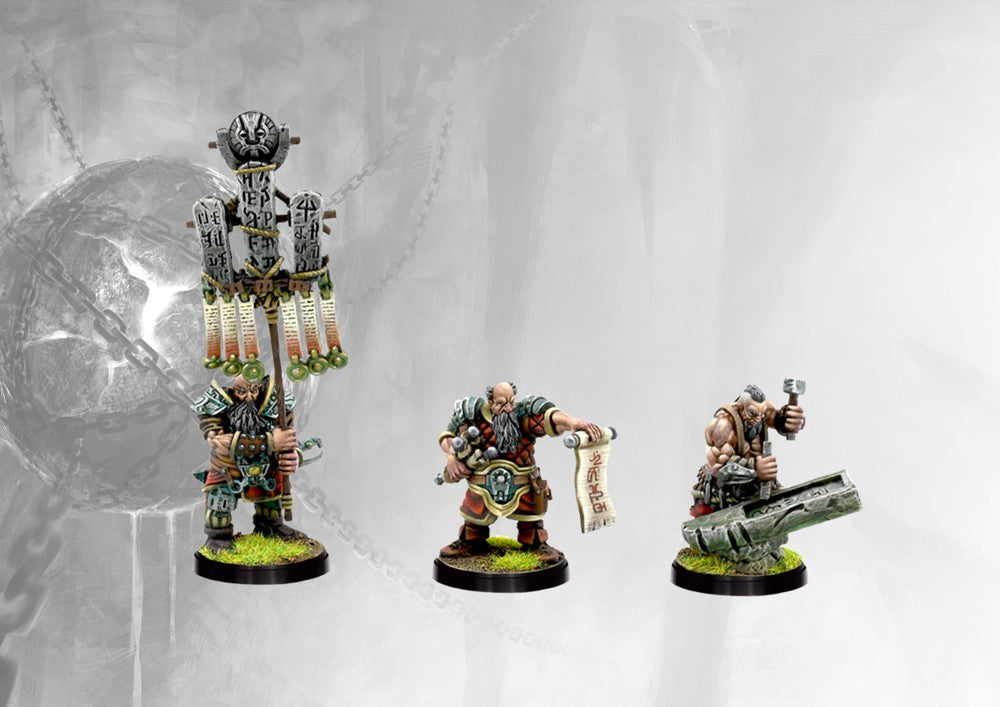 Fully painted Dweghom Tactical Retinue miniatures, showcasing the Standard Bearer (with runic banner) and Chronicler (reading a scroll) figures.