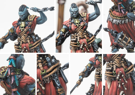 Close-up detail shots of the Scion of Conquest miniature, focusing on the blue skin, red armor wraps, bone accessories, and fierce expression.