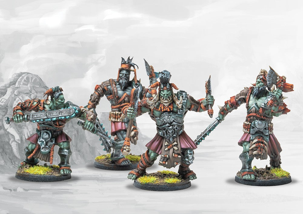 Four individual painted W'adrhŭn Chosen of Conquest/Veterans models, displaying various heavy weapons and detailed tribal armor.