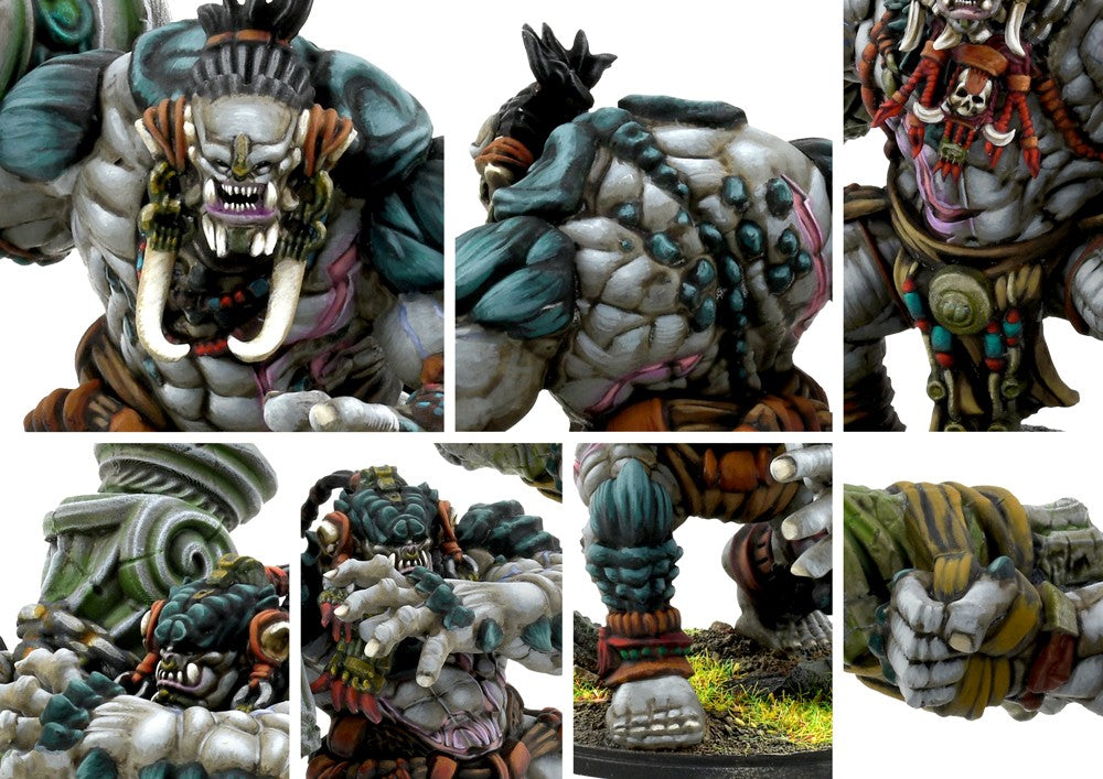 Close-up details of the W'adrhŭn Warbred brute model, highlighting the scarred flesh, large tusks, and aggressive facial expression.