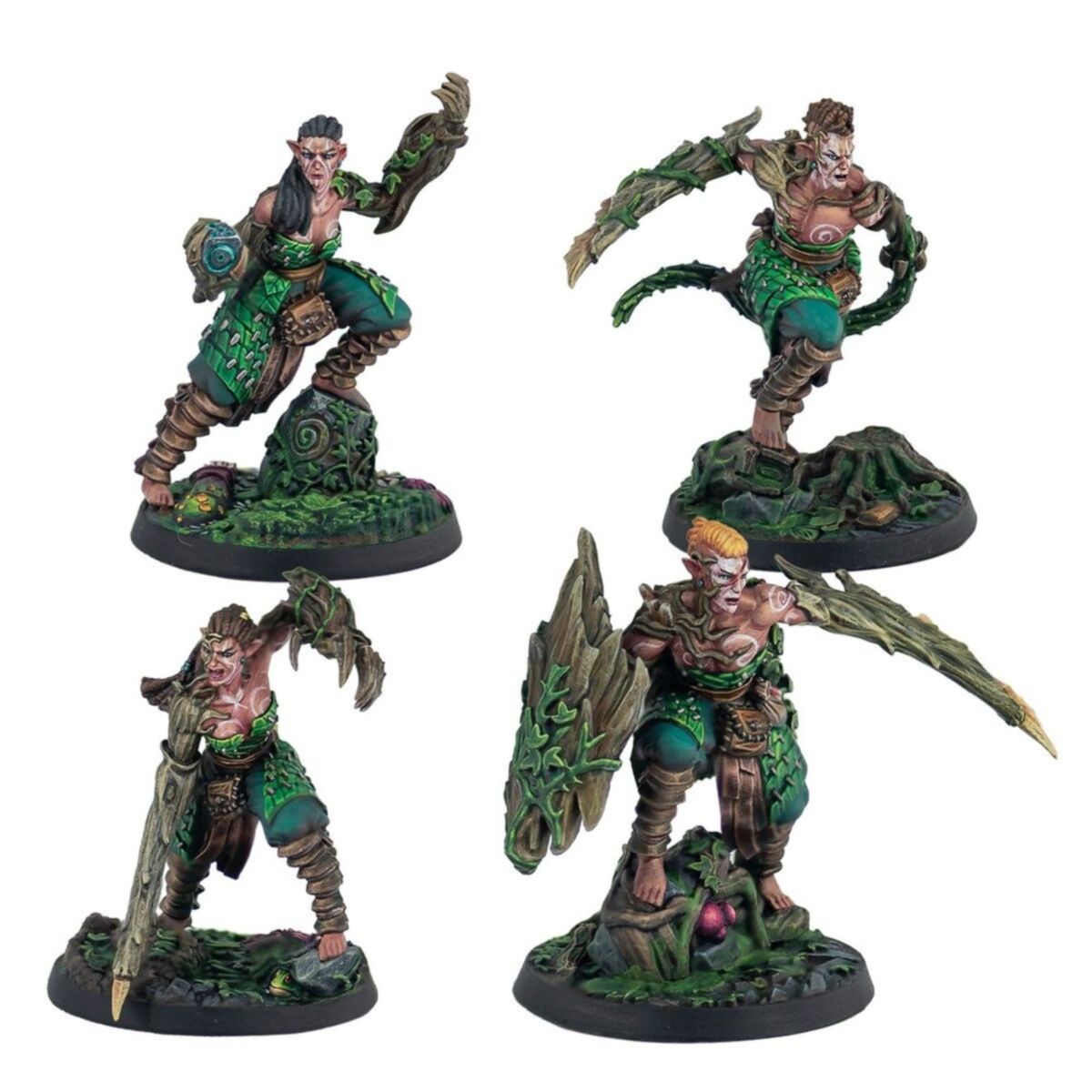 Fully painted Syenann Sprigs miniatures displayed on scenic bases.