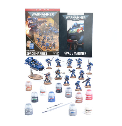The official retail product box for the Warhammer 40,000 Getting Started with Space Marines set, showing Space Marine miniatures, paints, and guide.