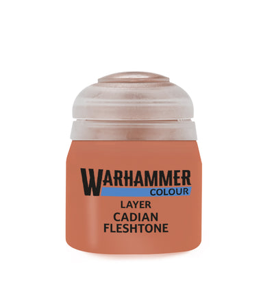 The official retail product paint pot for Warhammer Colour: Cadian Fleshtone.