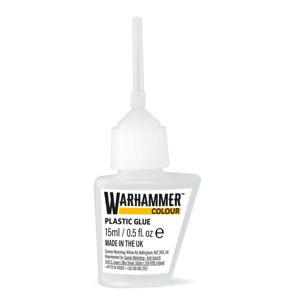 A bottle of the official Warhammer Colour Plastic Glue with its precision applicator nozzle.