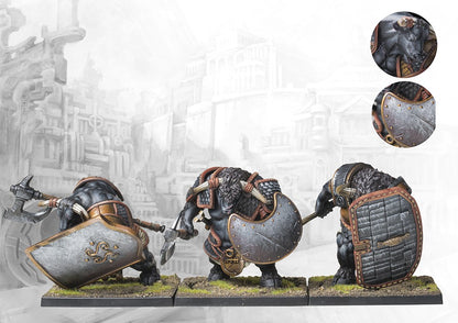 Three fully painted City States Minotaur Haspist miniatures on square bases, depicted as heavily armored minotaurs carrying massive shields and axes.