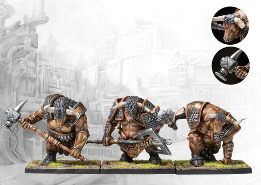 Three fully painted City States Minotaur Thyrean miniatures on square bases, depicted as powerful minotaurs wielding large two-handed axes and hammers.