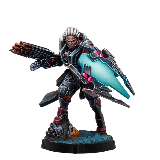 A painted Infinity Combined Army Achilles miniature, a heavily armored cybernetic warrior holding a large gun and an illuminated energy shield.