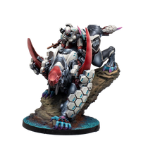 A painted Infinity Combined Army Juggernaut miniature, showing the infantry rider mounted on the massive, white and red armored assault creature.