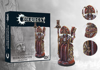 The product box and painted miniature for the Old Dominion Hierodeacon, a character in ornate red and gold robes holding a staff, with detail callouts.