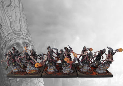 A fully painted unit of twelve Old Dominion Kheres miniatures on square bases, depicted as hooded spectral figures emerging from fiery smoke.