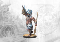 A close-up of the painted Sorcerer Kings Ghilman miniature from Conquest: Fanning the Fire, wearing a turban and holding a spear.