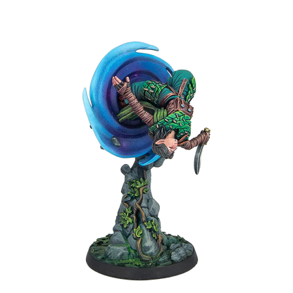 A fully painted Warcrow Aileen Cethir Wynn miniature, depicting the Sÿenann character emerging from a magical blue portal in a dynamic pose.