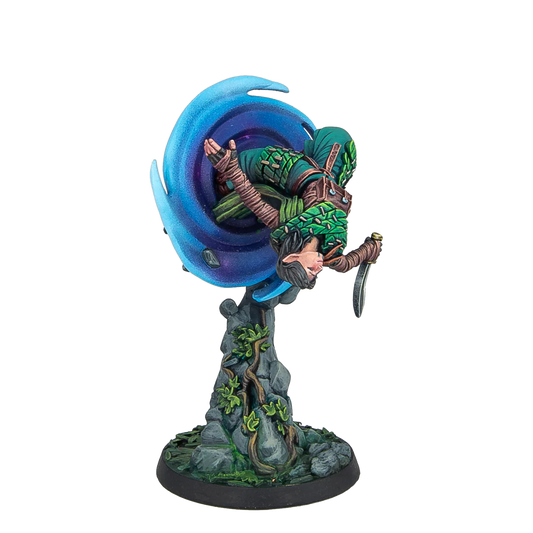 A fully painted Warcrow Aileen Cethir Wynn miniature, depicting the Sÿenann character emerging from a magical blue portal in a dynamic pose.