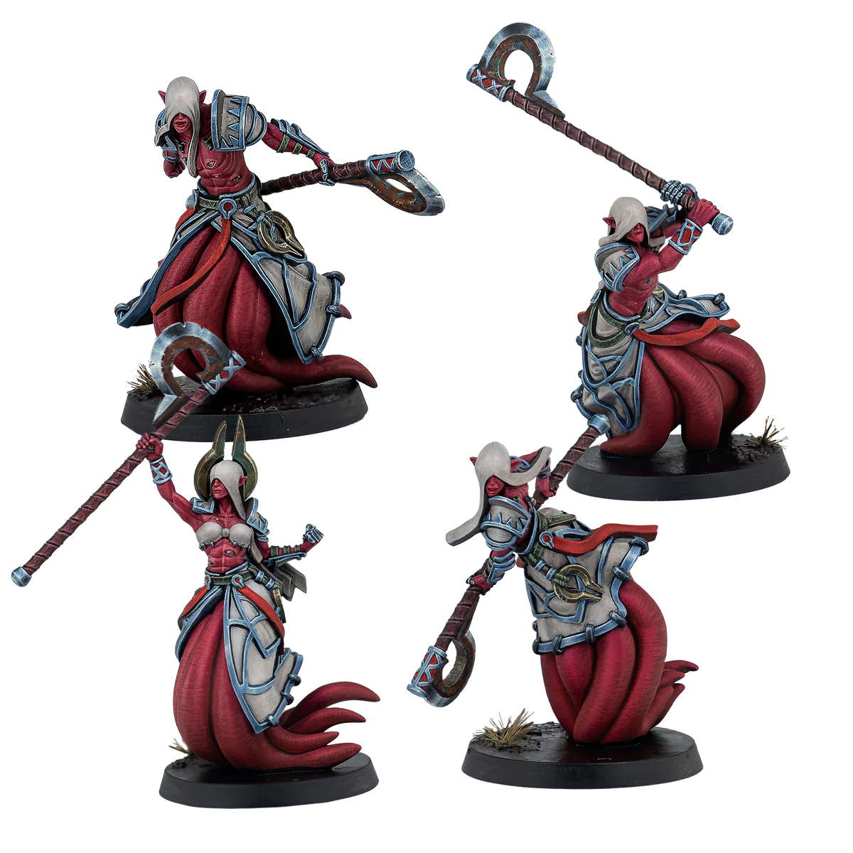 Four painted Warcrow Yaldabaoth Liberated miniatures, depicting red-skinned  warriors wielding large axes.