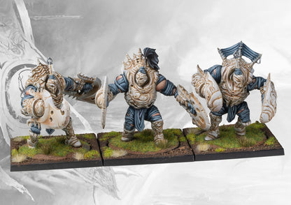 Fully painted plastic Brute Drones regiment from Conquest: The Spires, showing three large, heavily-armoured brute infantry models.