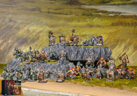 Fully painted Dweghom miniatures including Alekhaneros the Fire Thane, Flame Berserkers, Hold Thanes, and Fireforged on scenic bases.