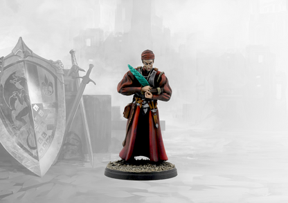 A studio-painted miniature of the Conquest Hundred Kingdoms Servite, a scholar in red robes writing in a book with a large quill.
