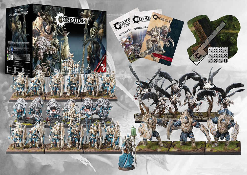 The complete contents of the Conquest Spires 2025 Supercharged Starter Set laid out, including painted miniatures (Force Grown Drones, Stryx, Desolation Drones, Brute Drones), Quick Start guides, tokens, and dice.