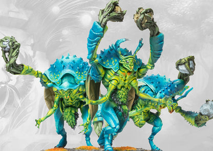 A dynamic trio of Gallowglass Wardens for the Spires, showcasing the teal and yellow iridescent organic armor plates of these Weaver Courts biological creations.