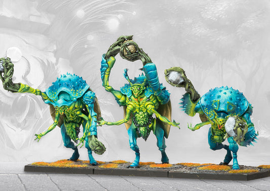 Three painted Gallowglass Wardens insectoid miniatures for the Spires faction in Conquest, carrying large boulders above their heads with organic claw-like limbs.