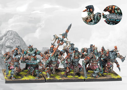 A fully painted W'adrhŭn Chosen of Conquest regiment, showcasing the heavily armored, elite infantry with imposing weapons and tribal command standard.