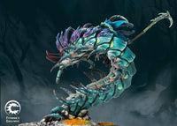 Side profile of the Winter's Bite Founder's Exclusive miniature, showing the length and teal-to-purple iridescent armor plates of the centipede.