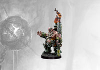 Fully painted Dweghom Flamecaster miniature, showcasing the heavily armored dwarf officer with a lit beard and the unique flame-tipped weapon.