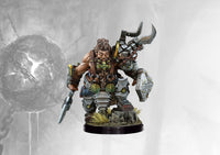 A painted Dweghom Hold Raegh miniature (alternate sculpt) showing the dwarf commander in heavy, ornate armor with large horns and axes.
