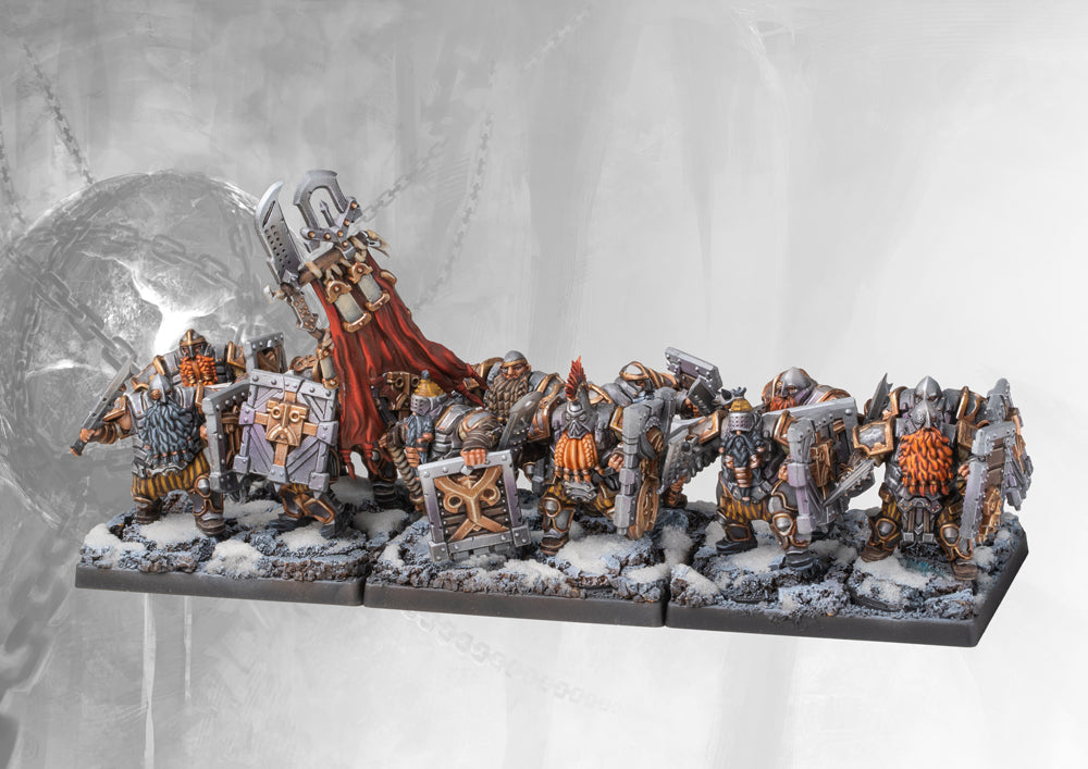A fully painted Dweghom Hold Ballistae war machine, showing the large siege weapon with its dwarf crew positioned behind a protective shield wall.