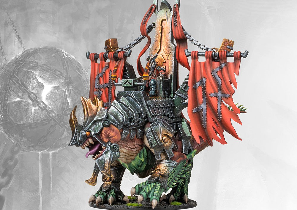 Fully painted Dweghom Ironclad Drake miniature, showcasing the massive, heavily armored warbeast ridden by a dwarf commander with war banners.