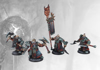 Four individual painted Dweghom Wardens miniatures, including the highly detailed Standard Bearer with the spike-adorned, flaming banner.