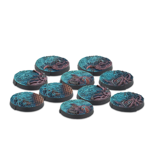 A group shot of the 10 unpainted 25mm Scenery Bases from the Zeta Series for Infinity.