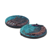 A group shot of the 2 unpainted 55mm Scenery Bases from the Zeta Series for Infinity.