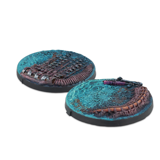 A group shot of the 2 unpainted 55mm Scenery Bases from the Zeta Series for Infinity.