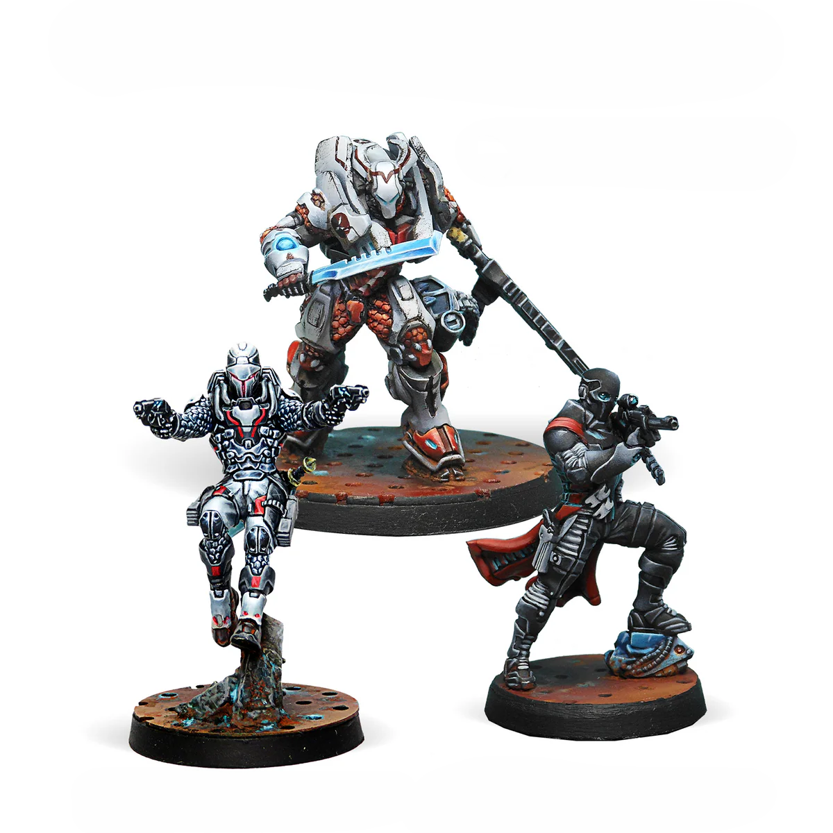 A group shot of the three painted metal miniatures from the Infinity Nomads Booster Pack Alpha: Taskmaster, Perseus, and a Grenzer.