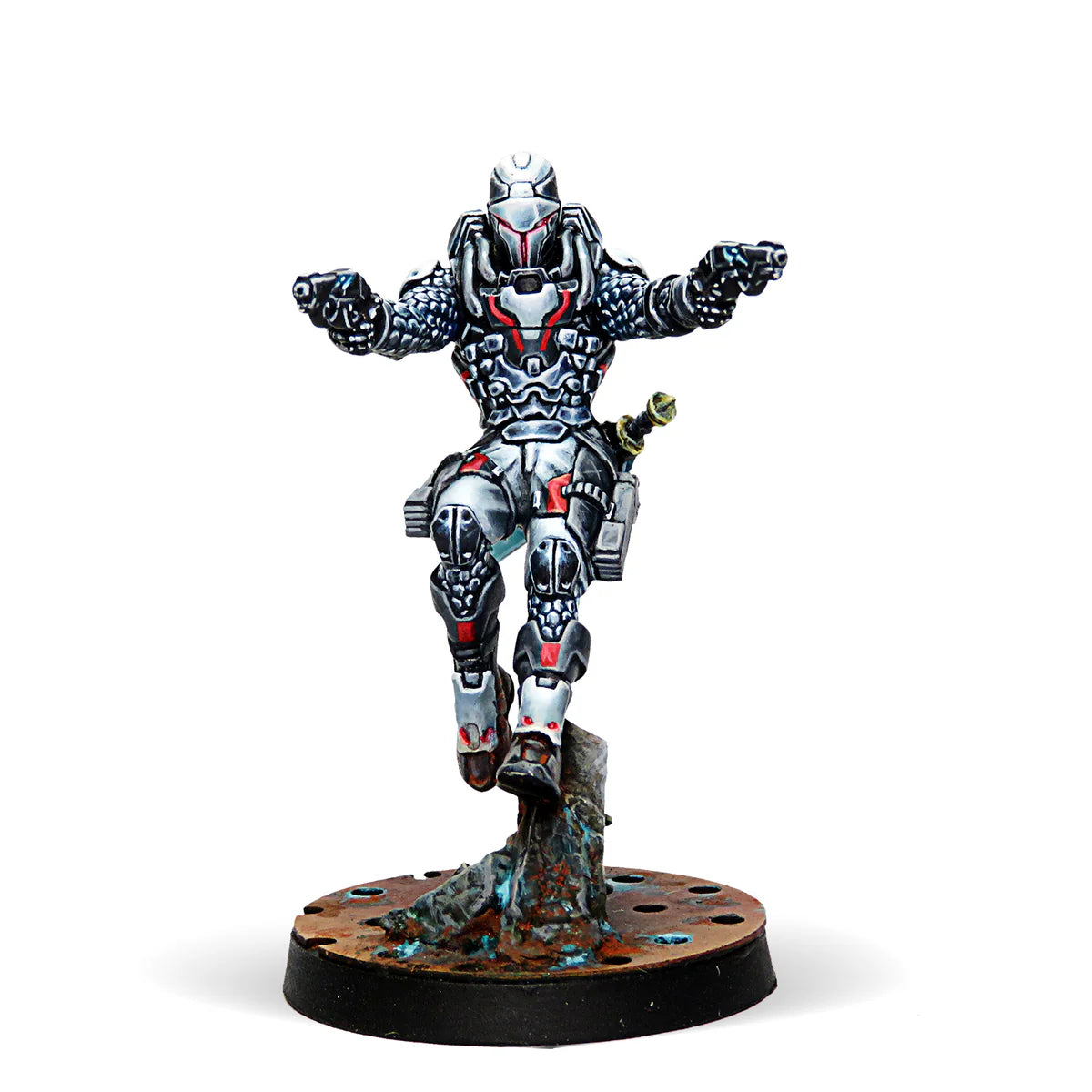 A painted Infinity miniature of Perseus, a Nomad character in sleek silver armour, wielding two heavy pistols.