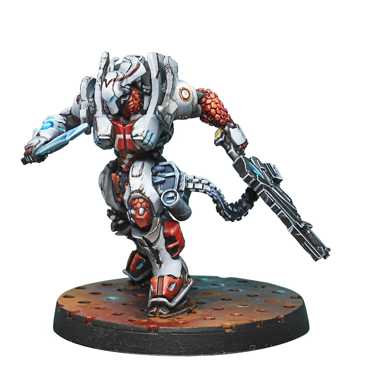 A painted Infinity miniature of a Nomad Taskmaster in white heavy armour, armed with a Heavy Machine Gun and an energy blade.