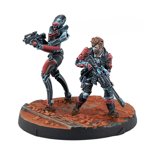 A group shot of the 2 painted metal miniatures from 