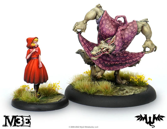 The two painted Malifaux miniatures from the To Grandmother's House We Go set: Little Red and the Big Bad wolf.