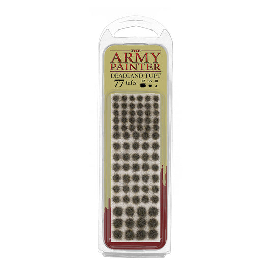 A blister pack of The Army Painter Deadland Tuft, showing 77 individual grass tufts with a dead, dark brownish-grey colour.