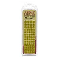 A blister pack of The Army Painter Meadow Flowers, showing 77 individual grass tufts with small yellow flowers.