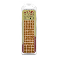 A blister pack of The Army Painter Mountain Tuft, showing 77 individual grass tufts with a dry, brownish-orange mountain colour.
