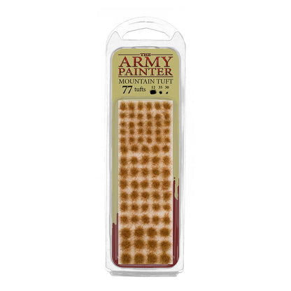 A blister pack of The Army Painter Mountain Tuft, showing 77 individual grass tufts with a dry, brownish-orange mountain colour.